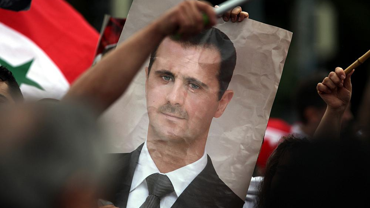 Bild von Baschar al-Assad auf einer Syrien-Demonstration (Archiv) - Foto: über dts Nachrichtenagentur