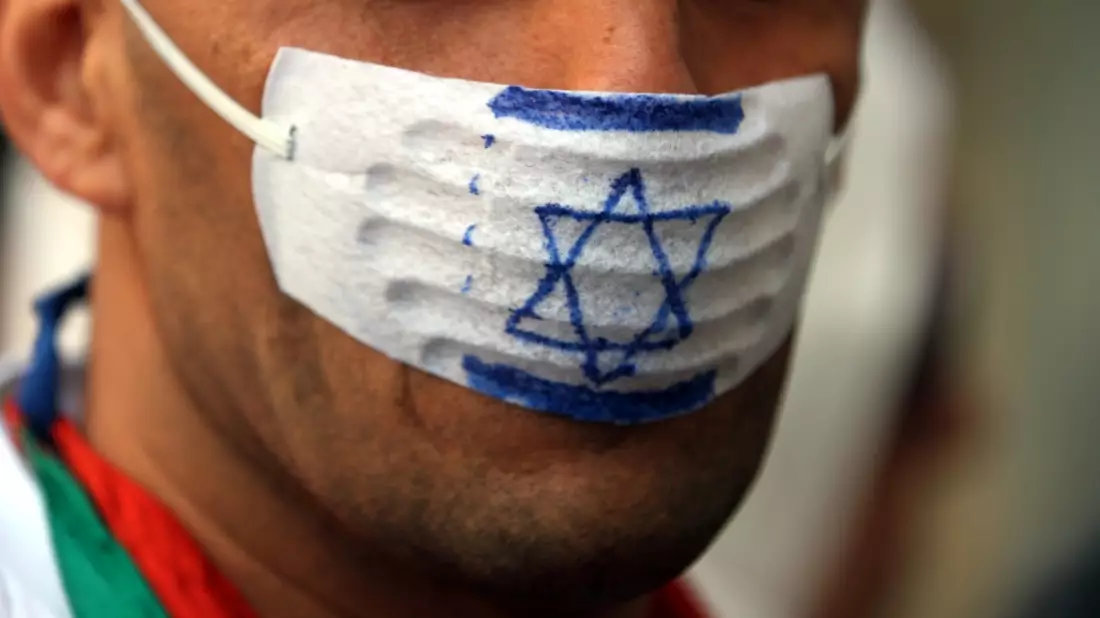Mann mit Anti-Israel-Mundschutz (Demonstration) - Bild: über dts Nachrichtenagentur