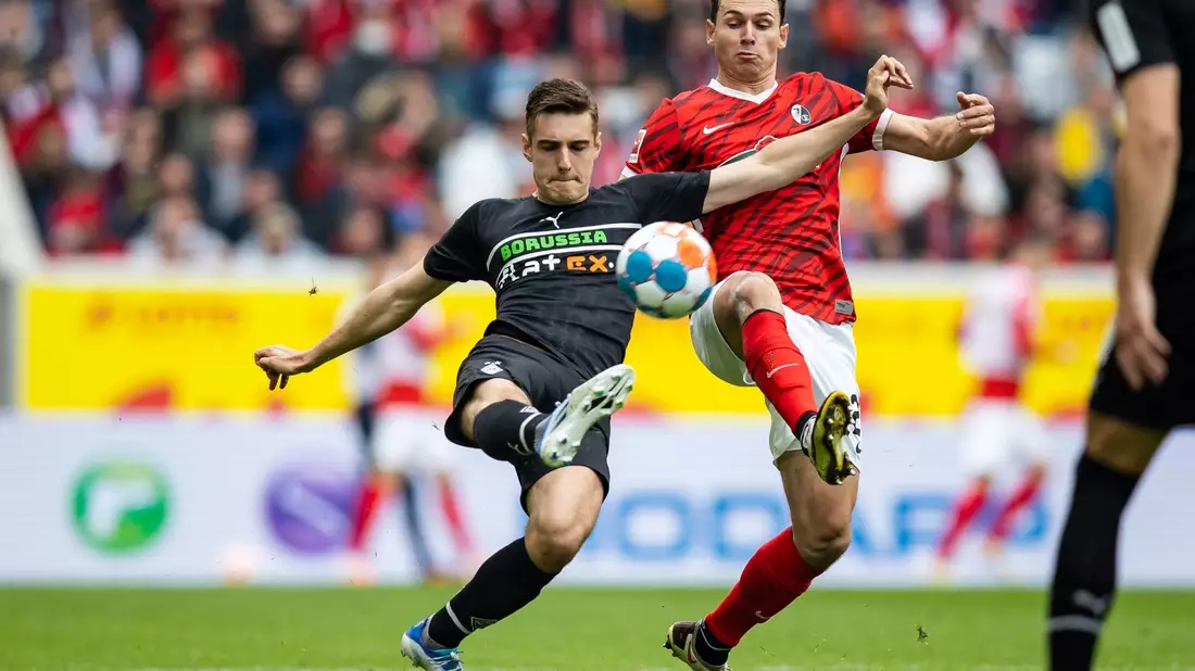 Unzufriedene Gesichter: Borussia Dortmund kam in Augsburg nur zu einem Remis. - Bild: Tom Weller/dpa