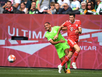 Bitter für Bayern: Stürmerin Jovana Damnjanovic muss nach einem heftigen Luft-Zweikampf mit Marina Hegering vorzeitig raus. - Foto: Swen Pförtner/dpa