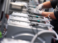 Waschmaschinen werden hergestellt. - Foto: Ralf Hirschberger/dpa-Zentralbild/dpa