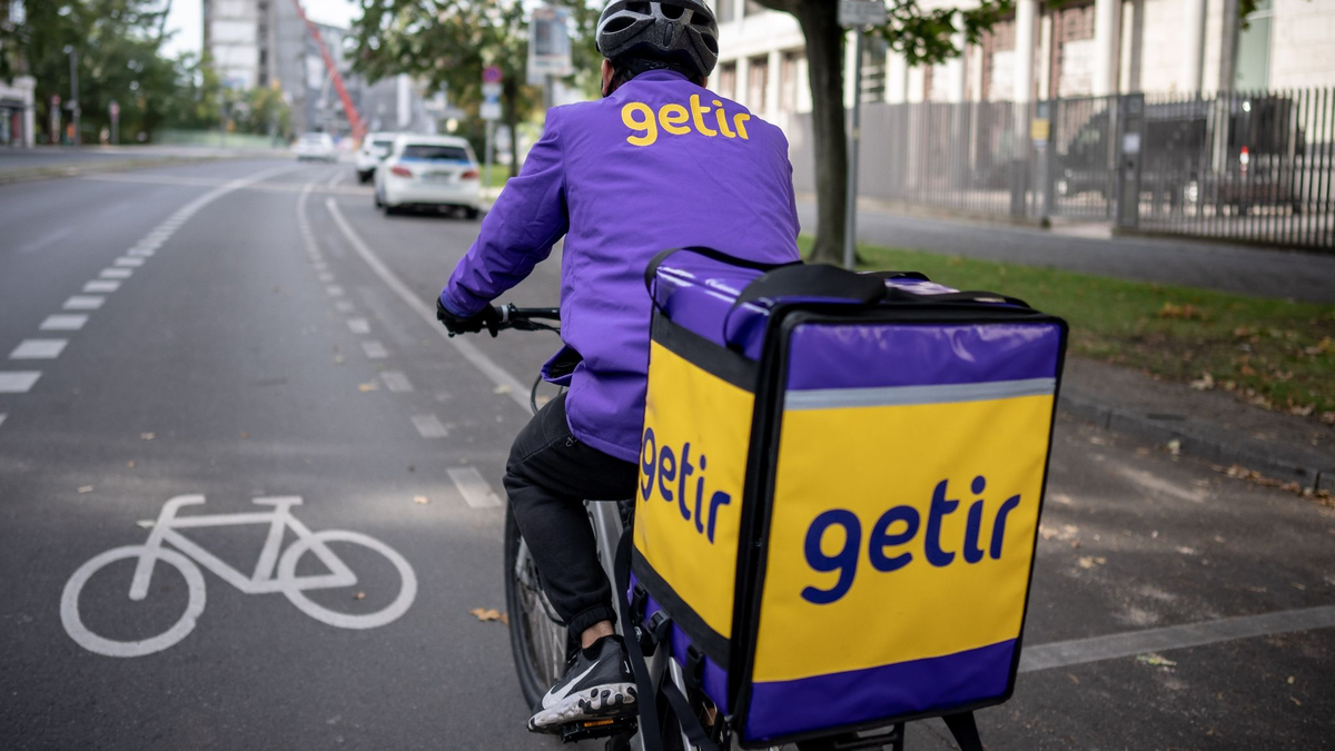 Der Lebensmittel-Lieferdienst Getir will sich von rund 2500 Mitarbeitern trennen. - Foto: Michael Kappeler/dpa