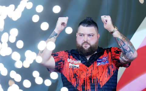 WM-Titelverteidiger Michael Smith schied bei der Weltmeisterschaft aus. - Foto: Zac Goodwin/PA Wire/dpa WM-Titelverteidiger Michael Smith schied bei der Weltmeisterschaft aus. - Foto: Zac Goodwin/PA Wire/dpa