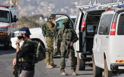 Israelische Soldaten sind während einer Demonstration an der Grenze zwischen Israel und Gaza im Einsatz. - Foto: Ilia Yefimovich/dpa