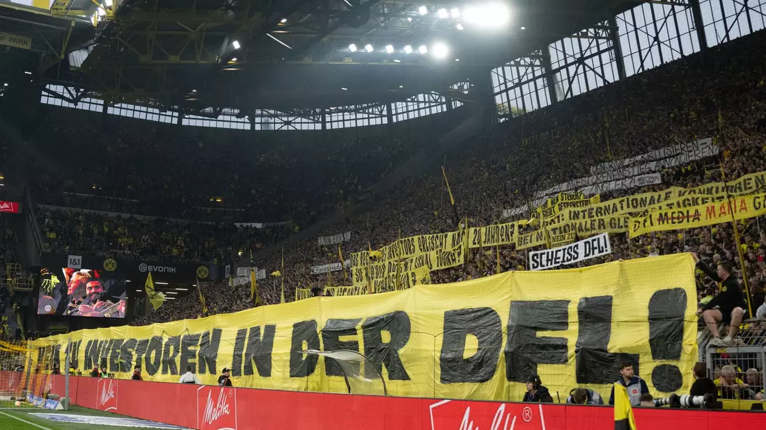 Dortmunds Fans demonstrieren gegen Investoren in der DFL. - Bild: Bernd Thissen/dpa