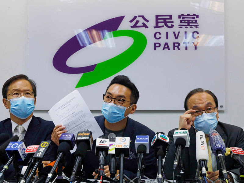 Mitglieder der pro-demokrtischen «Civic Party» während einer Pressekonferenz (Archivbild). - Foto: Kin Cheung/AP/dpa