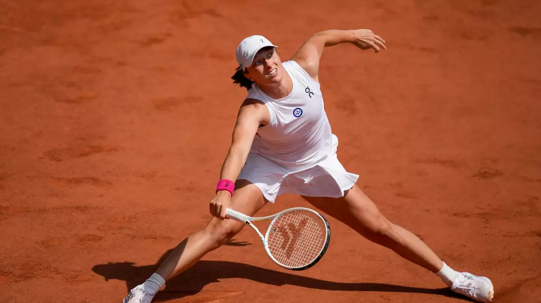 Gewann in Paris die French Open: Iga Swiatek. - Bild: Thibault Camus/AP/dpa