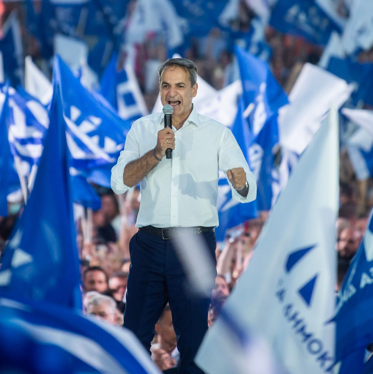 Kyriakos Mitsotakis, Vorsitzender der konservativen Partei «Neue Demokratie», spricht während einer Wahlkampfveranstaltung im Zentrum der griechischen Hauptstadt zu seinen Anhängern. - Foto: Angelos Tzortzinis/dpa