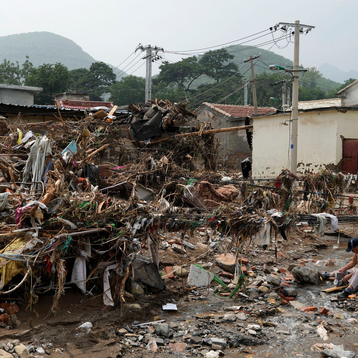 Heftige Regenfälle haben im Nordosten Chinas für Überschwemmungen gesorgt. - Foto: Ng Han Guan/AP
