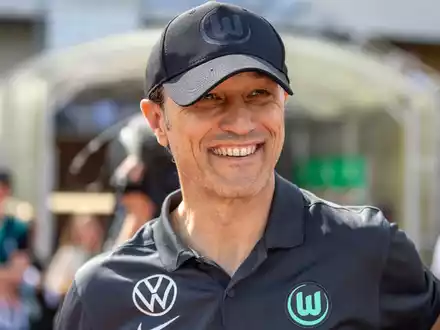 Er hatte allen Grund zum Lächeln: Wolfburgs Trainer Niko Kovac. - Foto: Andreas Gora/dpa