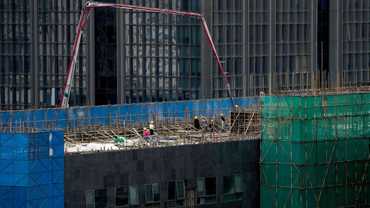 Bau eines Bürogebäudes in Peking. - Foto: Andy Wong/AP