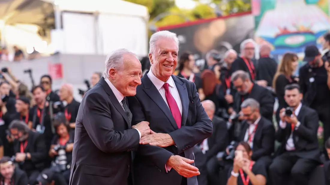 Regisseur Michael Mann (l) Enzo Ferraris Sohn Piero Ferrari zu Premiere. - Bild: Vianney Le Caer/Invision/AP/dpa