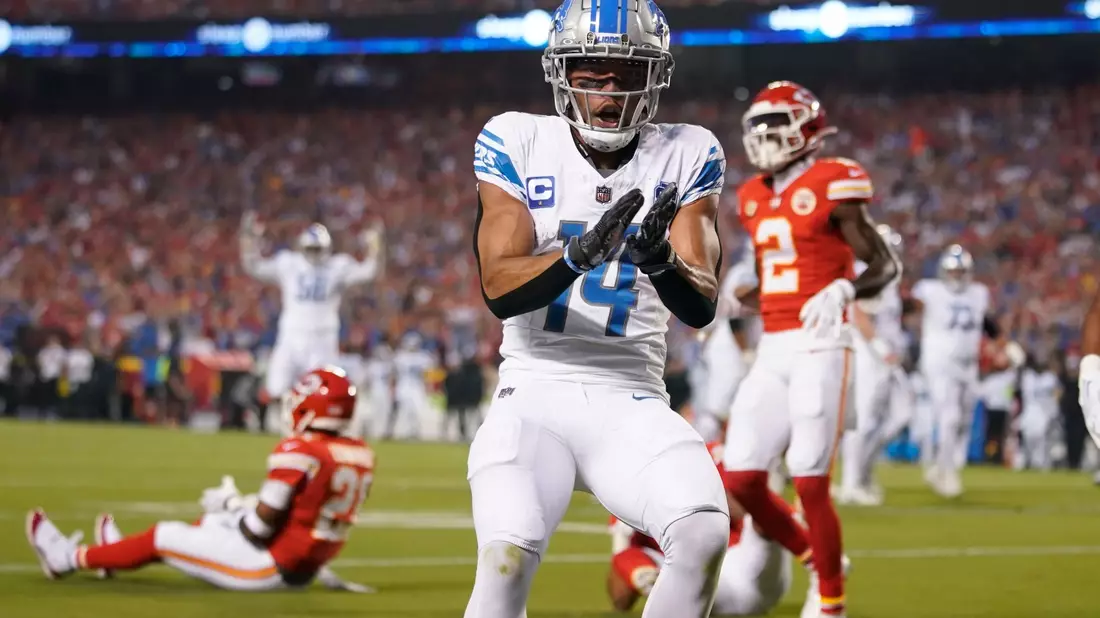Amon-Ra St. Brown von den Detroit Lions jubelt nach einem Touchdown. - Bild: Ed Zurga/AP/dpa