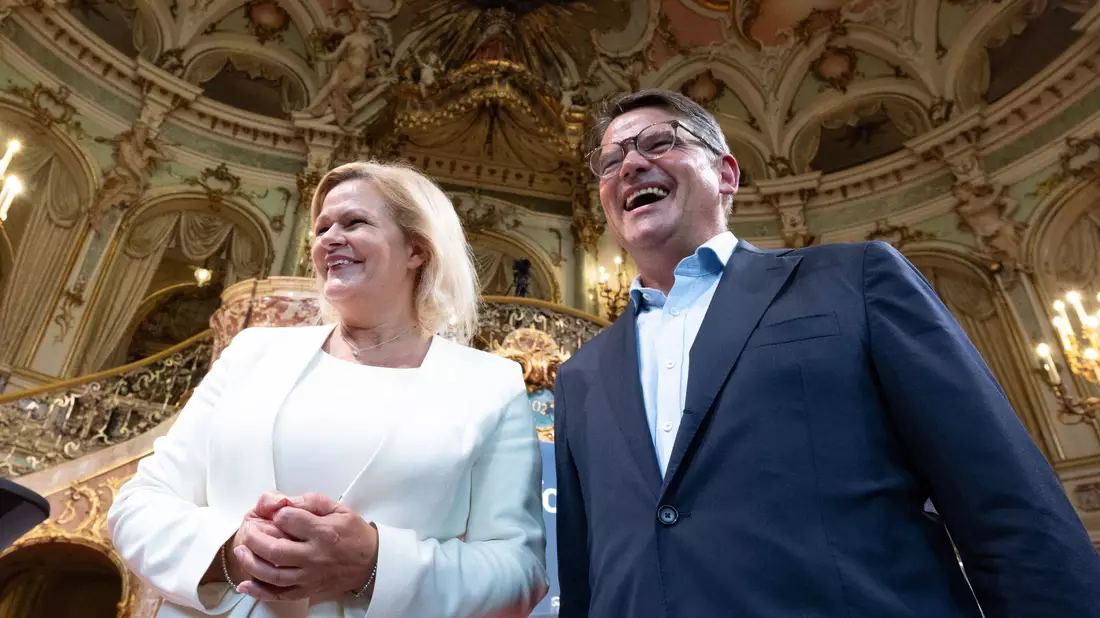 Die Spitzenkandidaten für die Landtagswahl in Hessen: Nancy Faeser (SPD) und Boris Rhein (CDU). - Bild: Boris Roessler/dpa