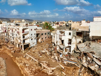 Straßen sind nach Überschwemmungen in Libyen zerstört. - Foto: Jamal Alkomaty/AP