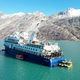 Das Kreuzfahrtschiff «Ocean Explorer» ist vor Grönland auf Grund gelaufen. - Foto: Uncredited/SIRIUS/Joint Artic Command/AP/dpa