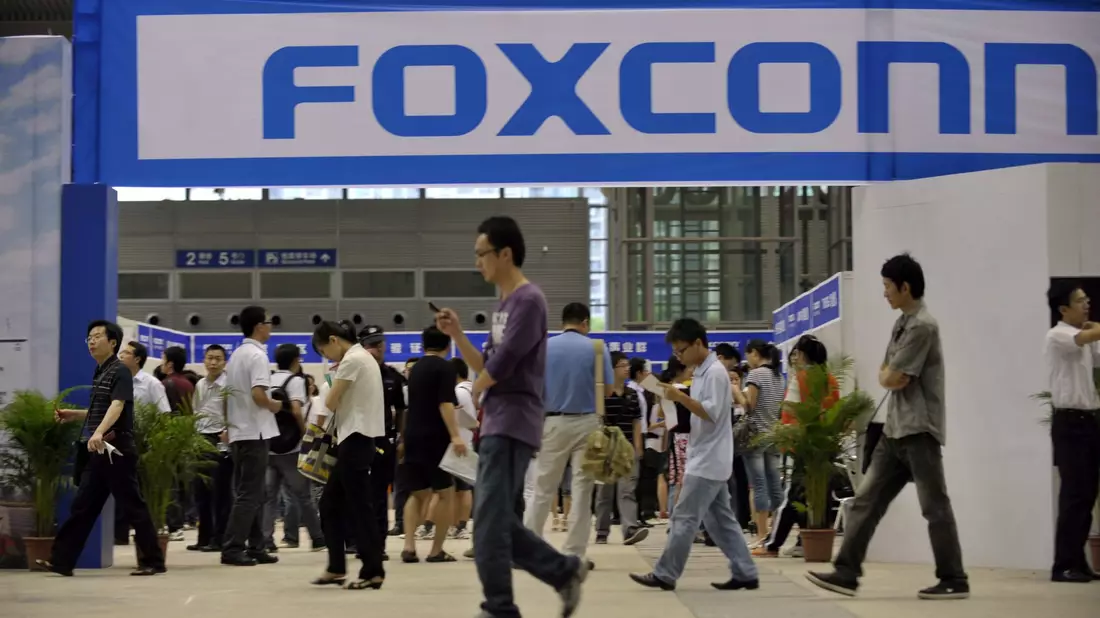 Angestellte eines Foxconn-Werkes. - Bild: Xuan Hui/FEATURECHINA/dpa