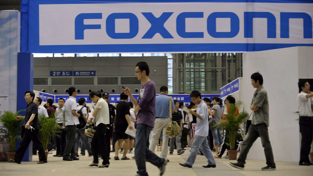 Angestellte eines Foxconn-Werkes. - Foto: Xuan Hui/FEATURECHINA/dpa