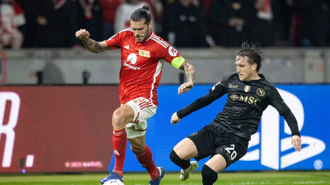 Kapitän Christopher Trimmel (l) und seine Unioner kassierten die neunte Pflichtspiel-Niederlage in Serie. - Bild: Andreas Gora/dpa