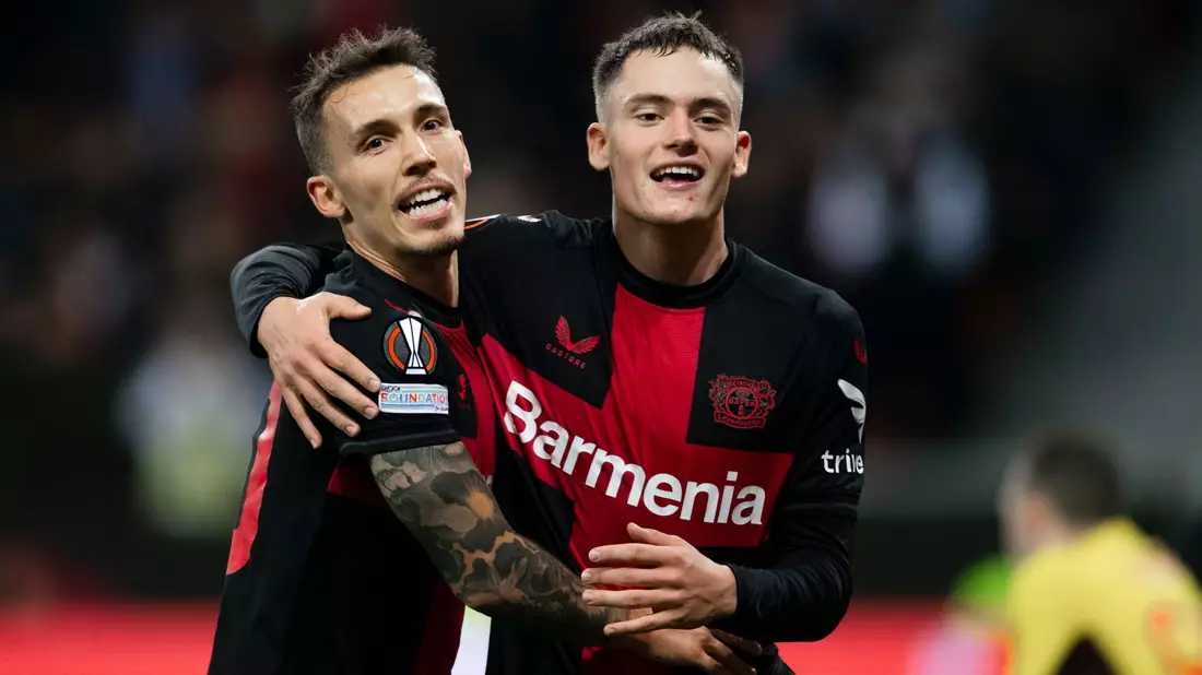 Erzielten drei der fünf Leverkusener Treffer gegen Karabach Agdam: Alejandro Grimaldo (l) und Florian Wirtz. - Bild: Marius Becker/dpa