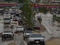 Überschwemmte Straßen im für seine Klippenspringer und Luxushotels berühmten Acapulco. - Foto: Marco Ugarte/AP