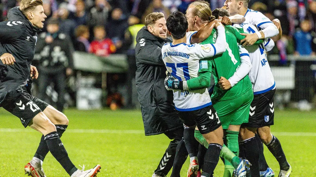 Magdeburg setzte sich nach Elfmeterschießen in Kiel durch. - Bild: Axel Heimken/dpa