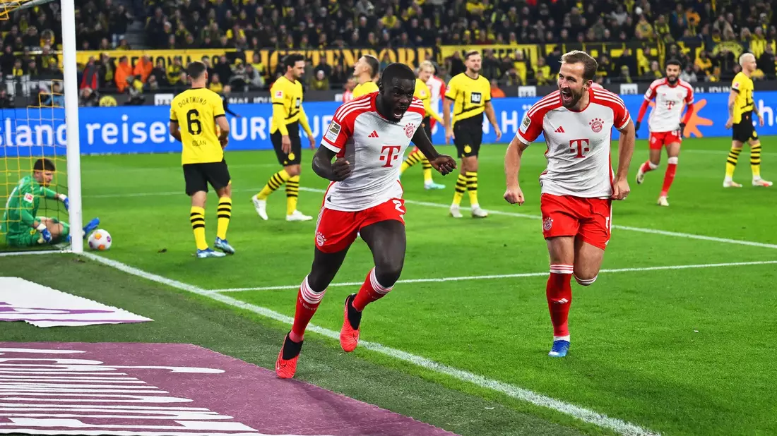 Dayot Upamecano (l) brachte die Bayern in Dortmund früh in Führung. - Bild: Bernd Thissen/dpa