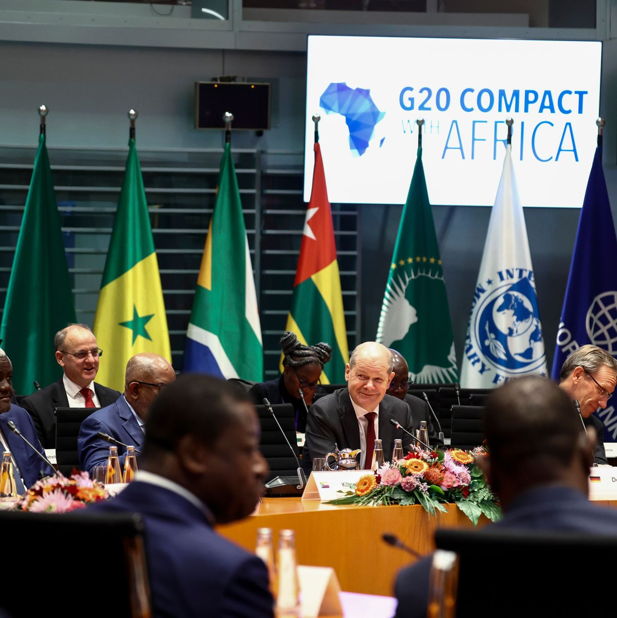 Bundeskanzler Olaf Scholz leitet den Investitionsgipfel «Compact with Africa». - Foto: Liesa Johannssen/REUTERS-Pool/dpa