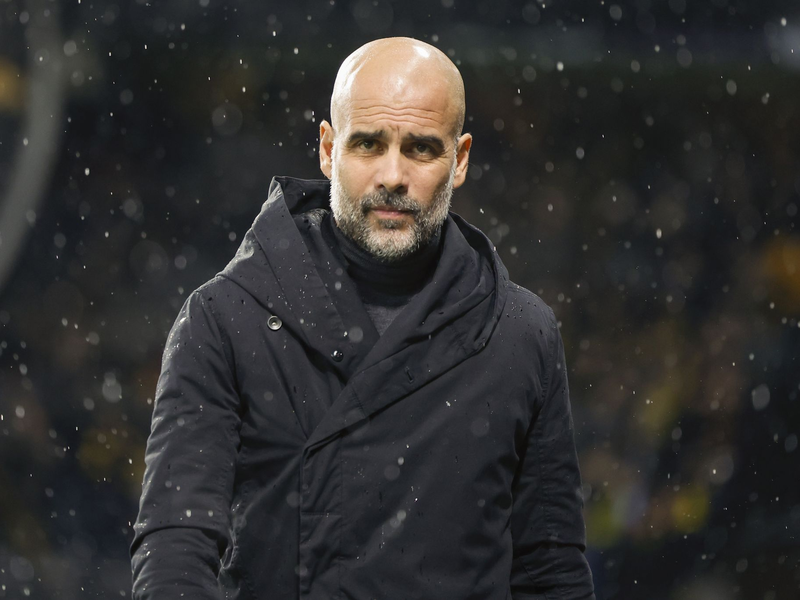 Man-City-Trainer Pep Guardiola würde wohl auch bei einem Zwangsabstieg seinem Club treu bleiben. - Foto: Peter Klaunzer/KEYSTONE/dpa