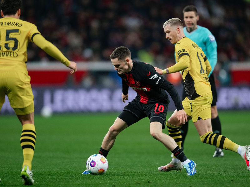 Die Leverkusener um Florian Wirtz (M) mussten zum zweiten Mal in dieser Saison Punkte abgeben. - Foto: Marius Becker/dpa