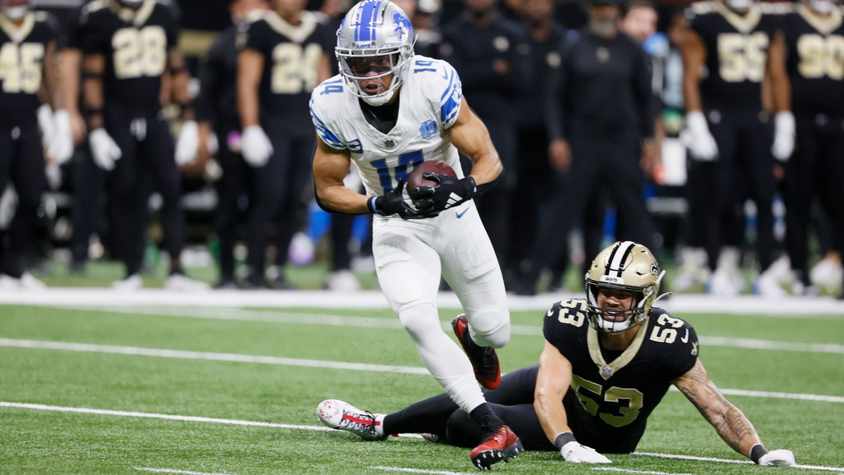 Amon-Ra St. Brown (l) holte mit den Lions den neunten Saisonsieg. - Foto: Butch Dill/FR111446 AP/dpa