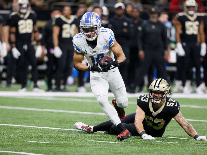 Amon-Ra St. Brown (l) holte mit den Lions den neunten Saisonsieg. - Foto: Butch Dill/FR111446 AP/dpa
