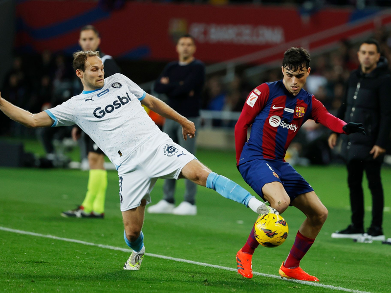 Beim FC Bayern ausgemustert, beim FC Girona erfolgreich: Daley Blind (l). - Foto: Joan Monfort/AP/dpa