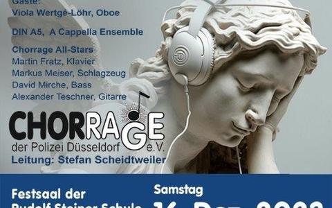 POL-D: Veranstaltungshinweis - Chorrage der Polizei Düsseldorf präsentiert Konzert im Advent - Plakat hängt an - Foto: presseportal.de