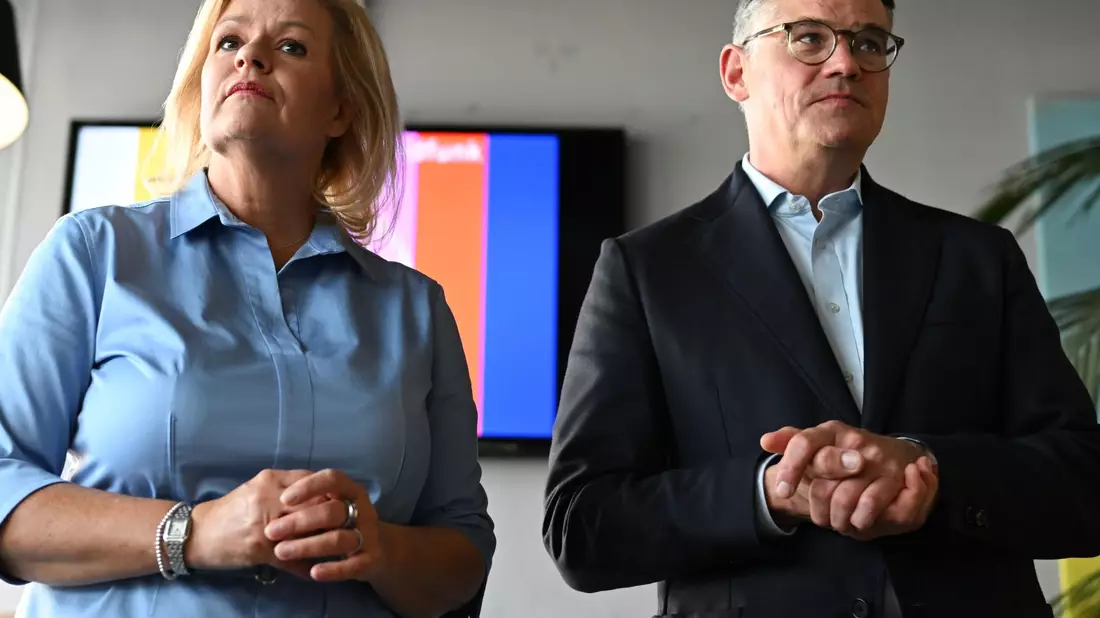 Künftige Koalitionäre: Nancy Faeser (SPD) und Ministerpräsident Boris Rhein (CDU). - Bild: Arne Dedert/dpa