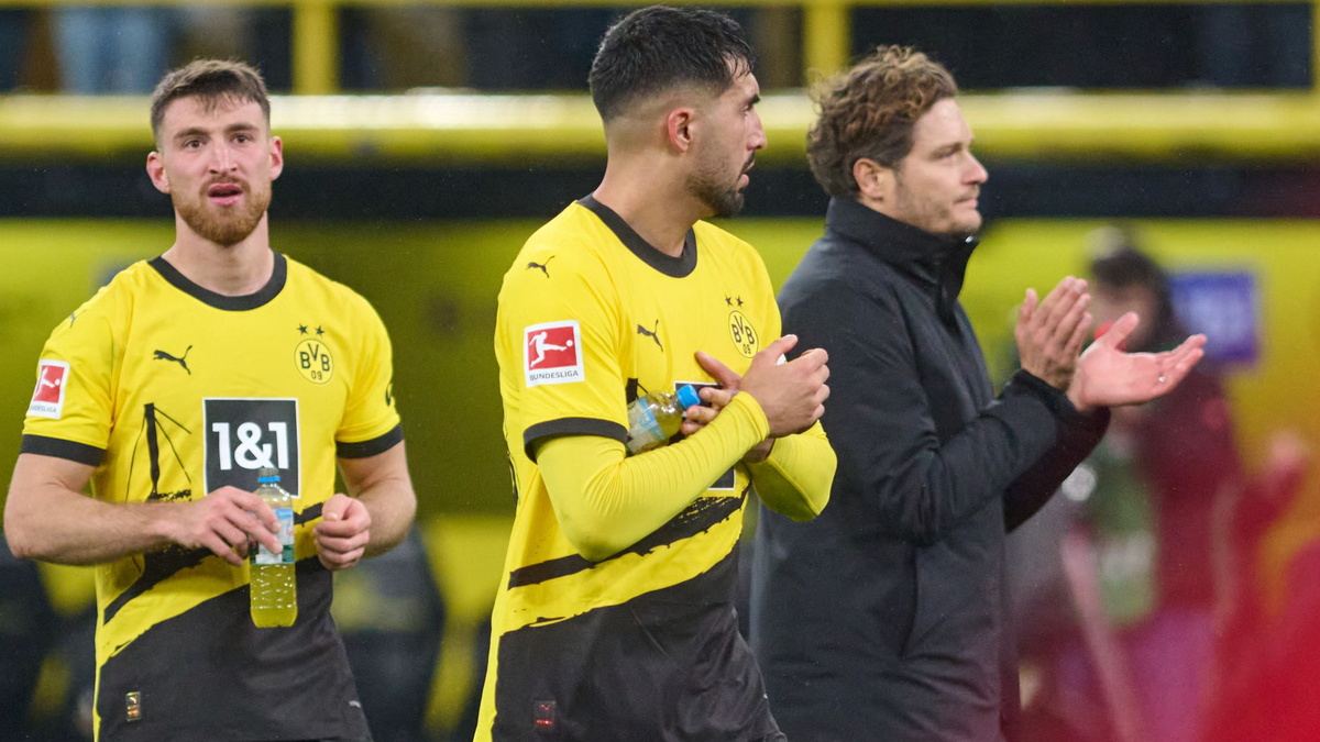 Dortmunds Salih Özcan, Trainer Edin Terzic und Emre Can (l-r) nach einem Spiel. - Foto: Bernd Thissen/dpa