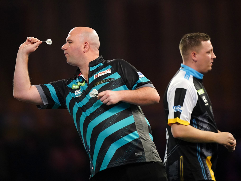 Der Engländer Rob Cross bei der Darts-WM. - Foto: Zac Goodwin/PA Wire/dpa