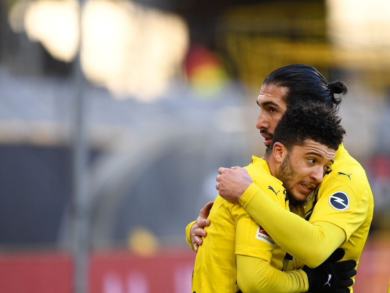 Emre Can (r) wünscht sich eine Rückkehr von Jadon Sancho zum BVB. - Foto: Marius Becker/dpa