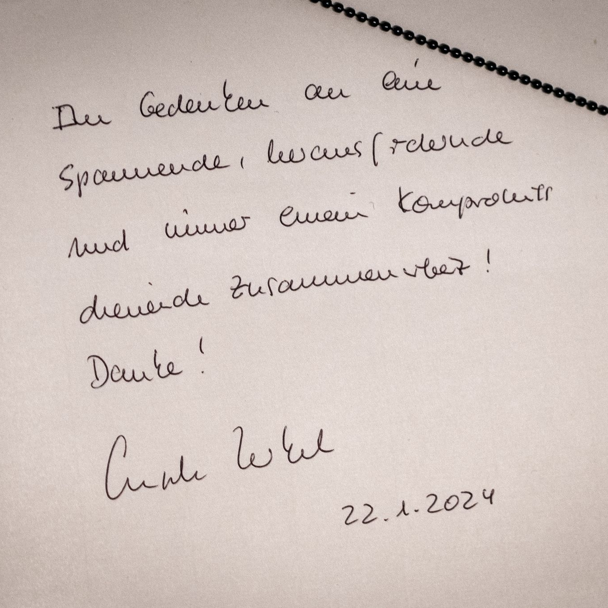 Merkels Eintrag ins Kondolenzbuch. - Foto: Michael Kappeler/dpa