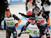 Justus Strelow (r) beim Wechsel auf den zweiten Läufer, Philipp Nawrath (l). - Foto: Hendrik Schmidt/dpa