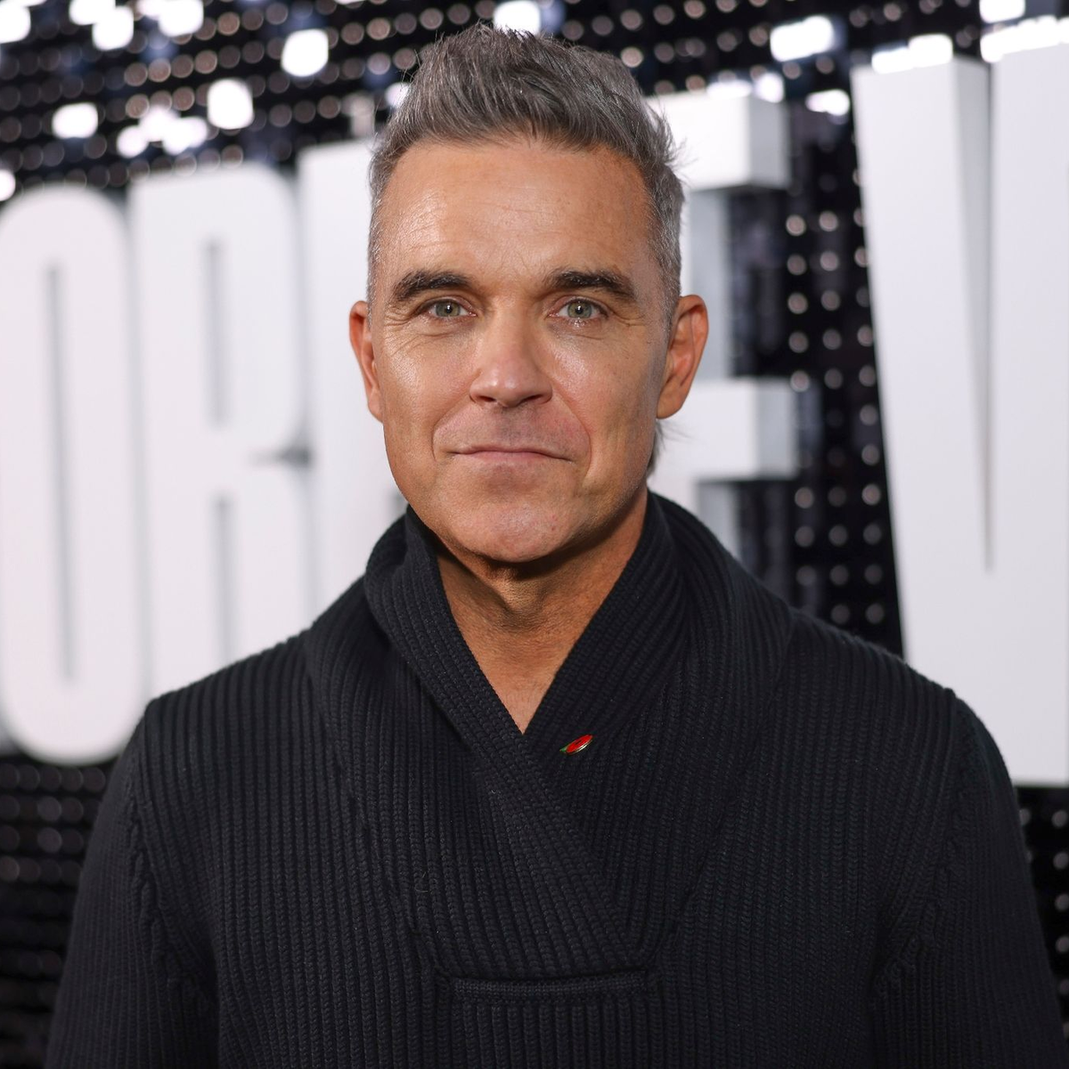 Robbie Williams feiert seinen 50. Geburtstag. - Foto: Vianney Le Caer/AP/dpa