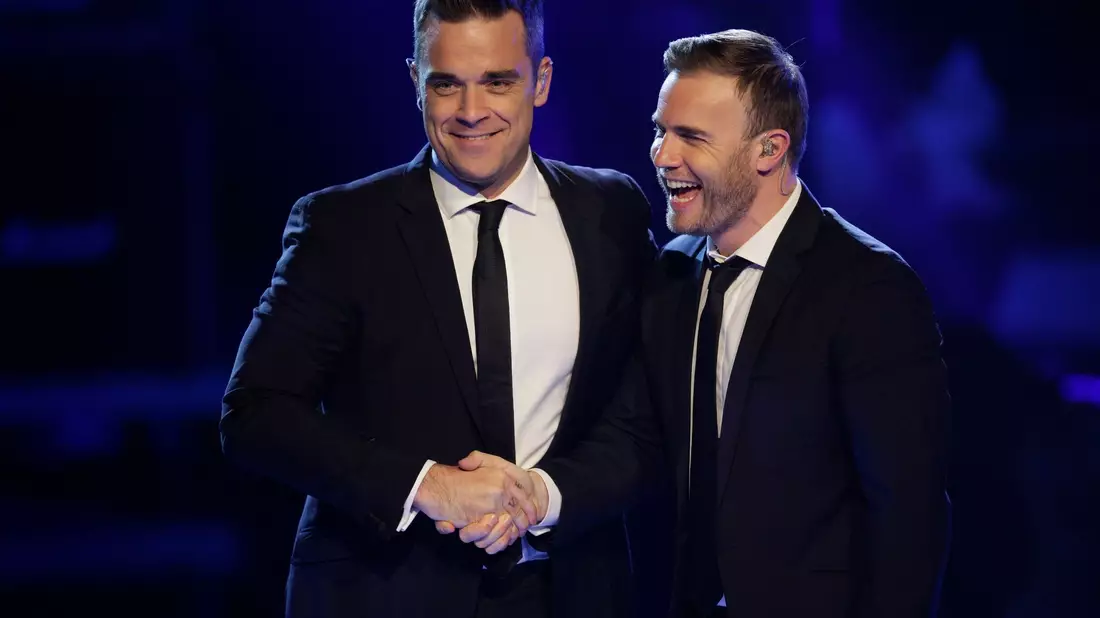 Seine verbalen Angriffe gegen seine Take-That-Kollegen, insbesondere Gary Barlow, sind Williams heute peinlich. Auf dem Foto treten die beiden Sänger in der Castingshow «Popstars - Girls Forever» in Köln auf (Archivbild). - Bild: Rolf Vennenbernd/dpa