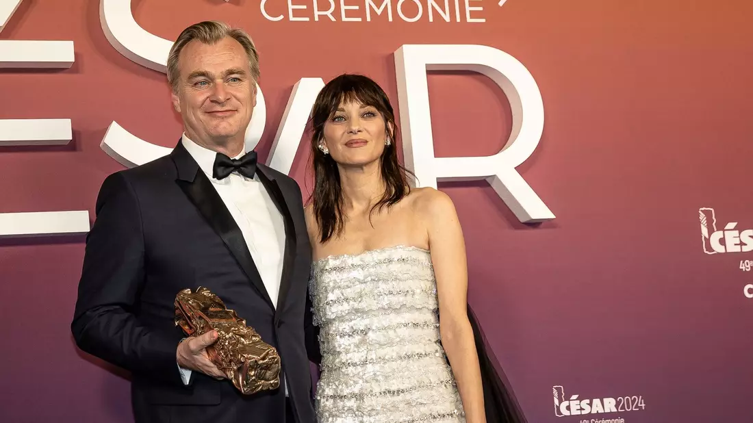 Die Französin Marion Cotillard (r) spielte in mehreren Filmen unter Christopher Nolan mit. - Bild: Aurelien Morissard/AP/dpa