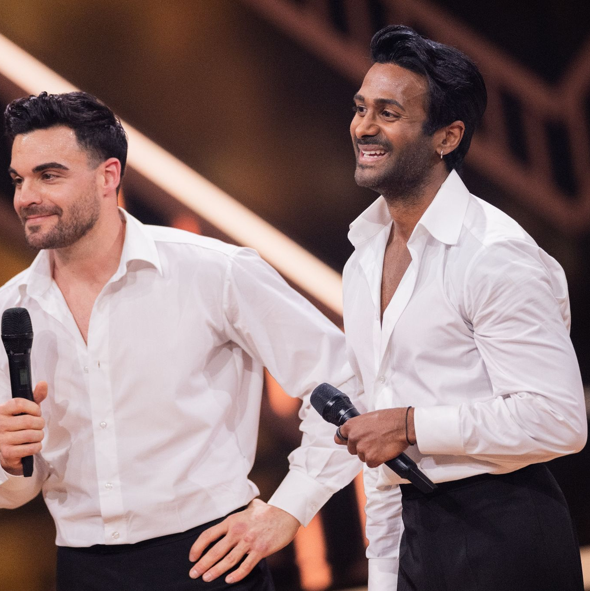 Coach Biyon Kattilathu (r) und Food-Creator Stefano Zarrella, der von Juror Joachim Llambi einiges zu hören bekam. - Foto: Rolf Vennenbernd/dpa