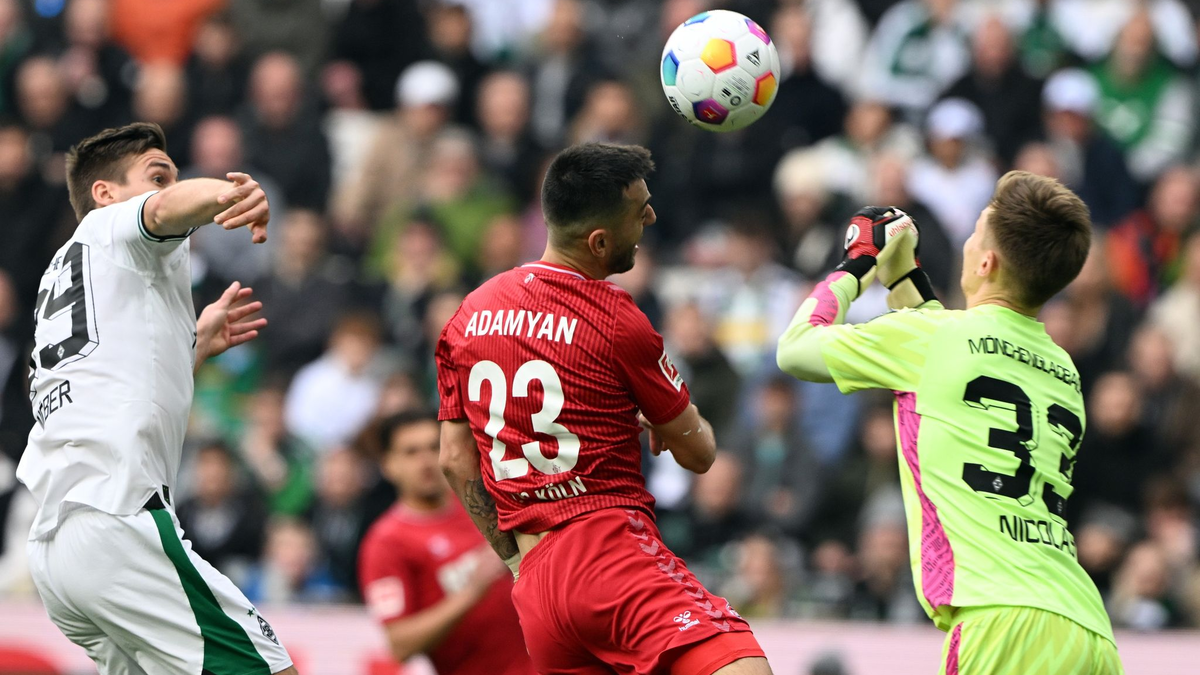 Sargis Adamyan (M) und der 1. FC Köln nehmen einen Punkt aus Mönchengladbach mit. - Foto: Federico Gambarini/dpa