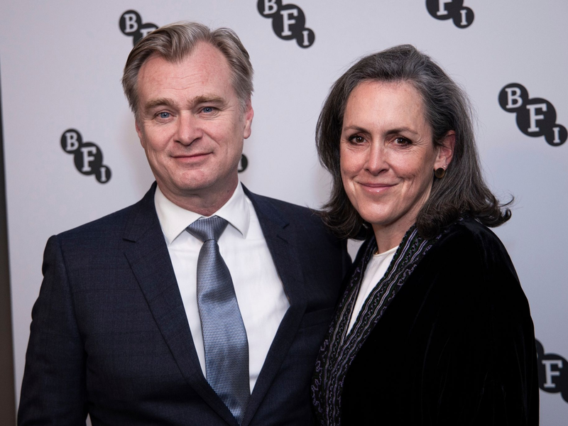 Christopher Nolan und Emma Thomas erhalten den Ritterschlag. - Foto: Vianney Le Caer/Invision/dpa