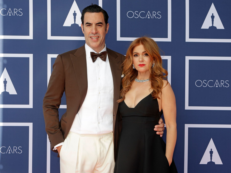 Sacha Baron Cohen und seine Frau Isla Fisher kommen zu einer Vorführung der Oscars in Sydney an. - Foto: Rick Rycroft/Pool AP/dpa