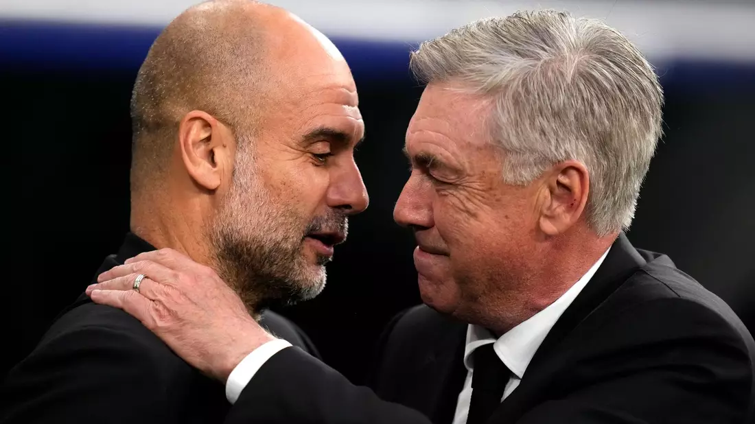 Beide Trainer zeigten sich mit dem Unentschieden zufrieden: Manchesters Pep Guardiola (l) und Madrids Carlo Ancelotti (Archivbild). - Bild: Manu Fernandez/AP/dpa