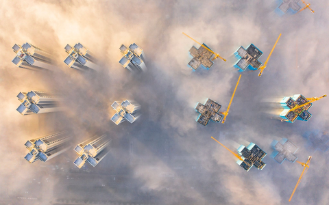 Luftbild einer Baustelle in China. - Foto: Liuu Xu/XinHua/dpa