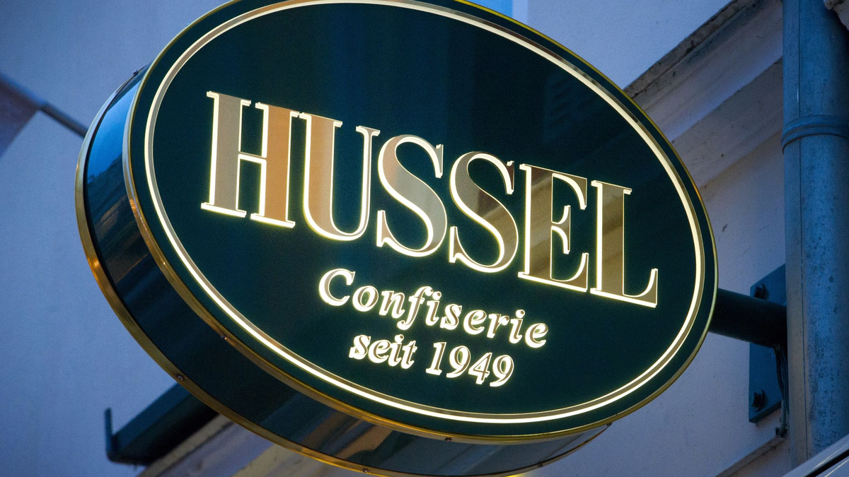 Das Logo der Confiserie «Hussel». - Foto: Stefan Sauer/dpa-Zentralbild/dpa